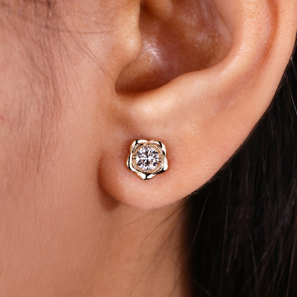 Handmade lab grown diamond flower earrings.
