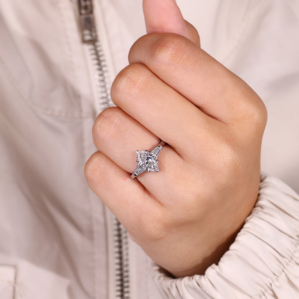 Marquise cut ring with claw prong setting.

