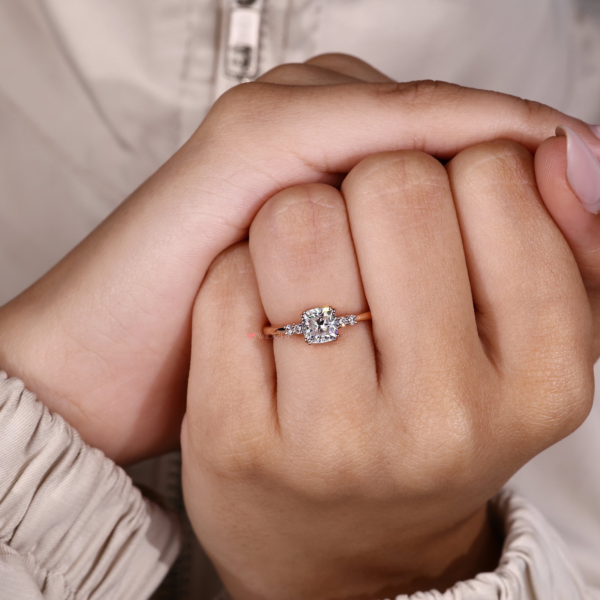 Double prong engagement ring securely holding the center stone with a strong and open view.
