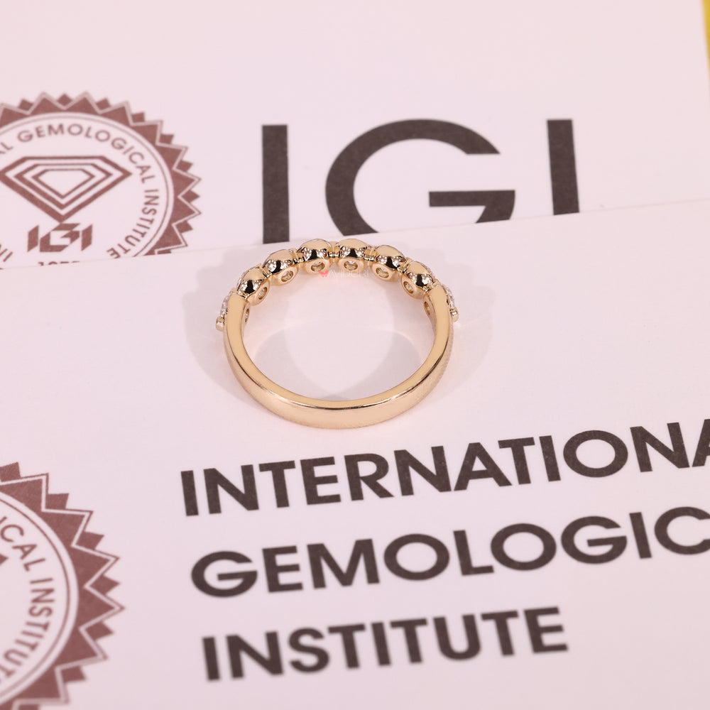 Buy a wedding band in yellow gold style.