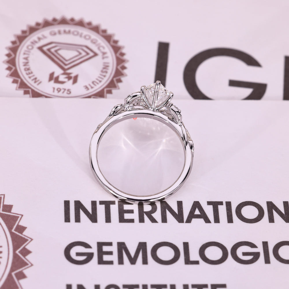 Lab grown marquise diamond three stone ring.
