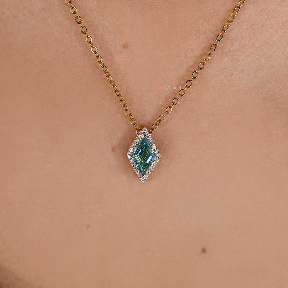 Cyan blue moissanite pendant in halo style.

