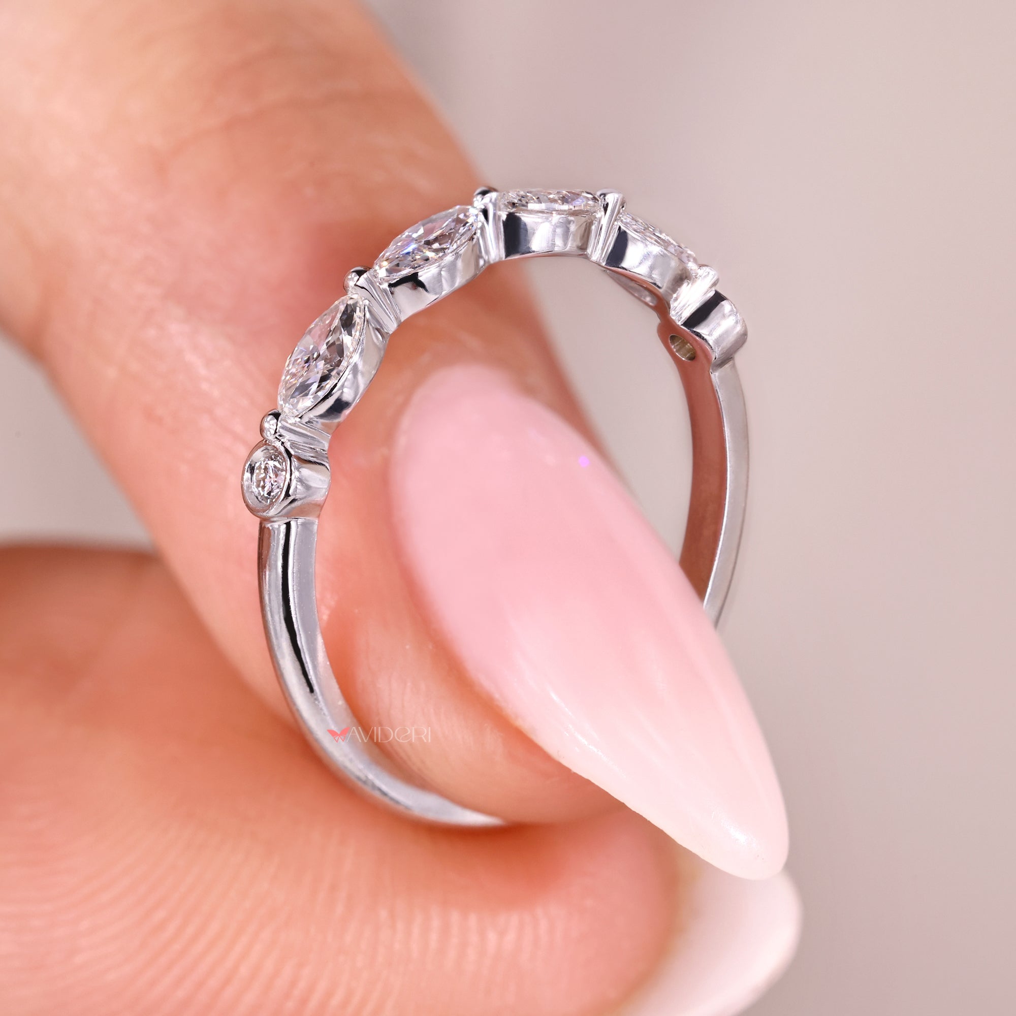 Shared Prong band showcasing marquise diamonds with a secure and elegant setting