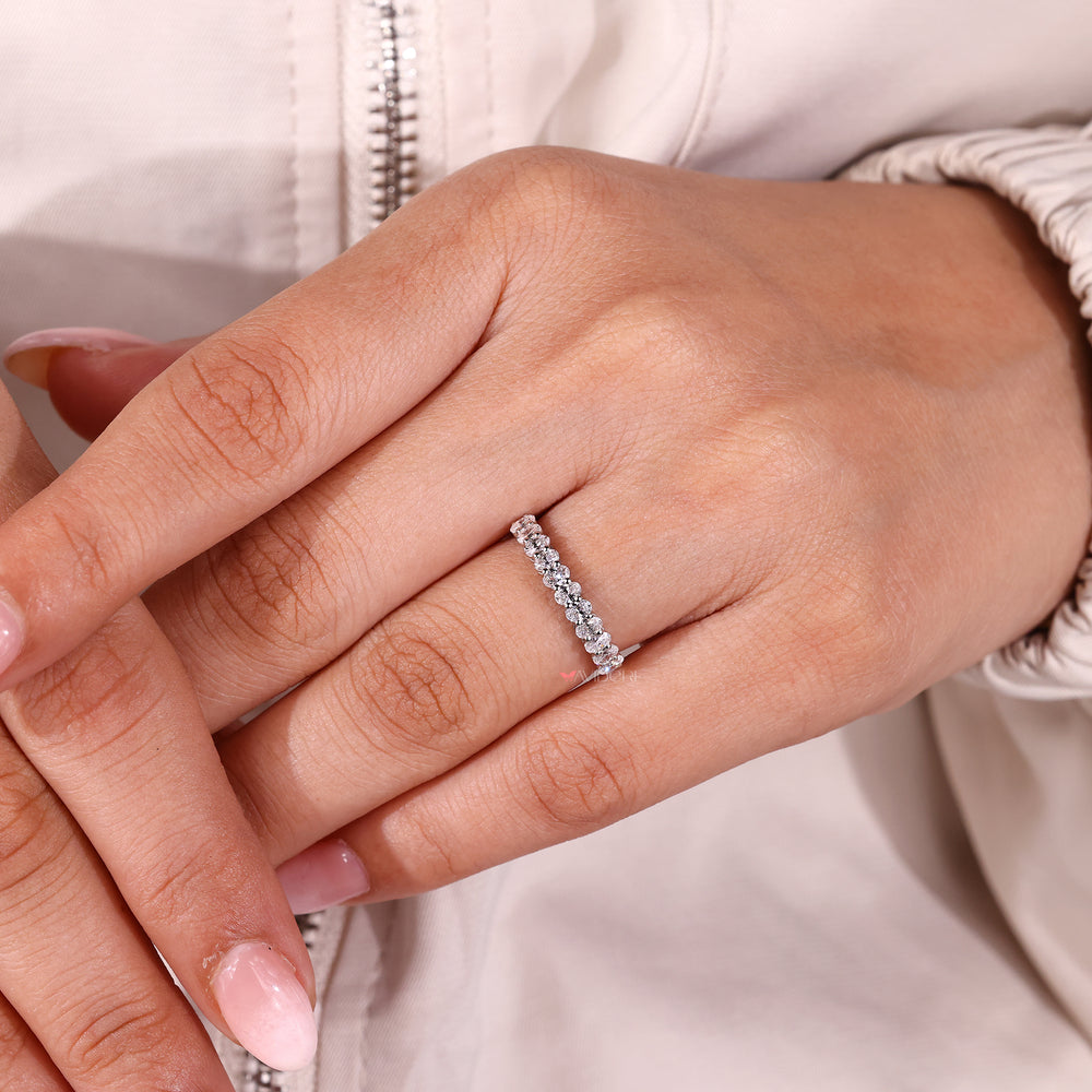 Handmade jewelry featuring a diamond wedding band.