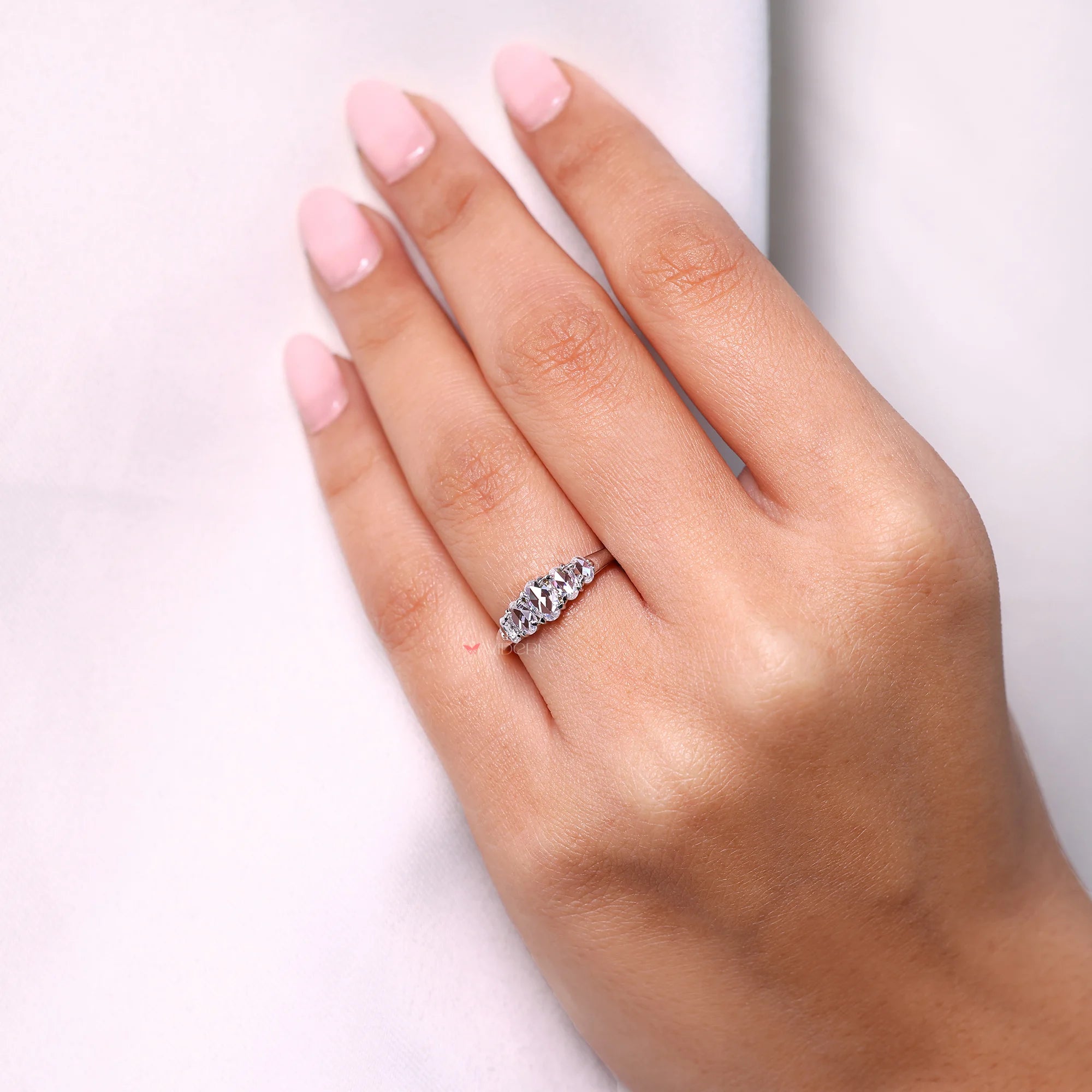 Avideri wedding band with 5 stone wedding band.
