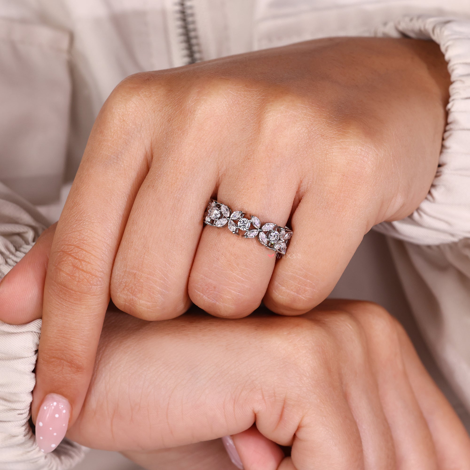 This moissanite band offers clarity and lasting brilliance.