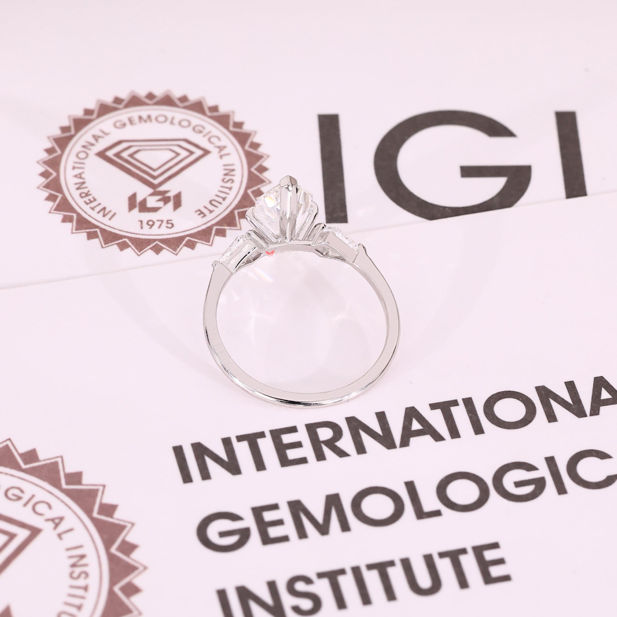 White gold engagement ring handmade with Lab Grown Diamond and elegant detailing.