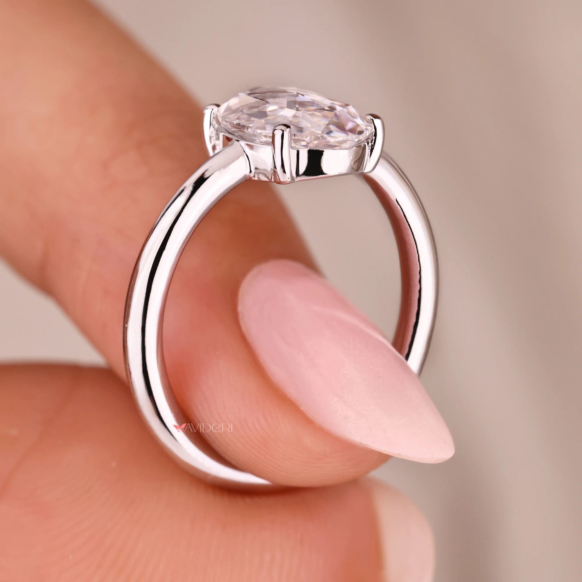 White gold engagement ring with solitaire diamond ring.