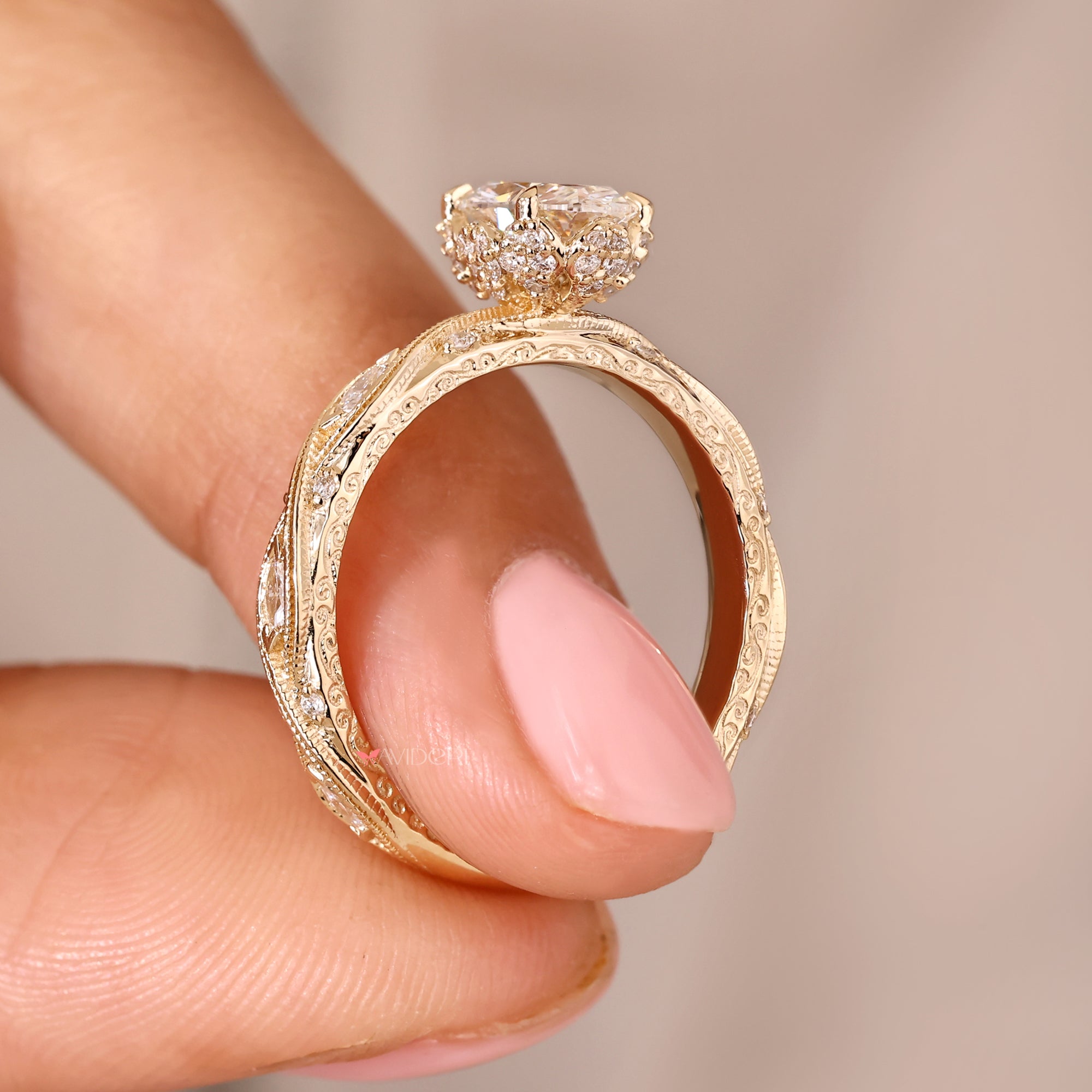 Handmade ring featuring milgrain setting and marquise and round side diamond.
