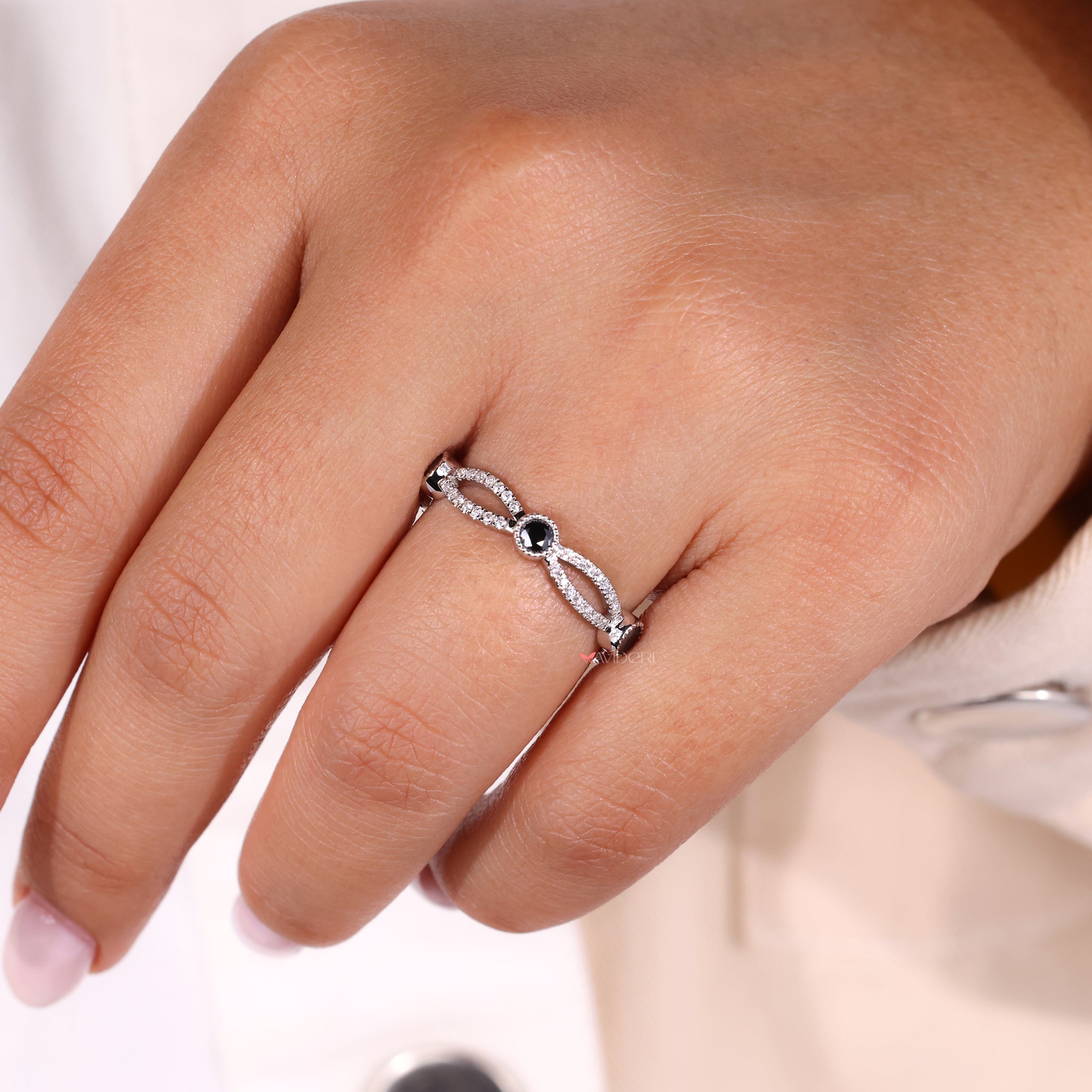 Twisted wedding band with infinity wedding band design for style.