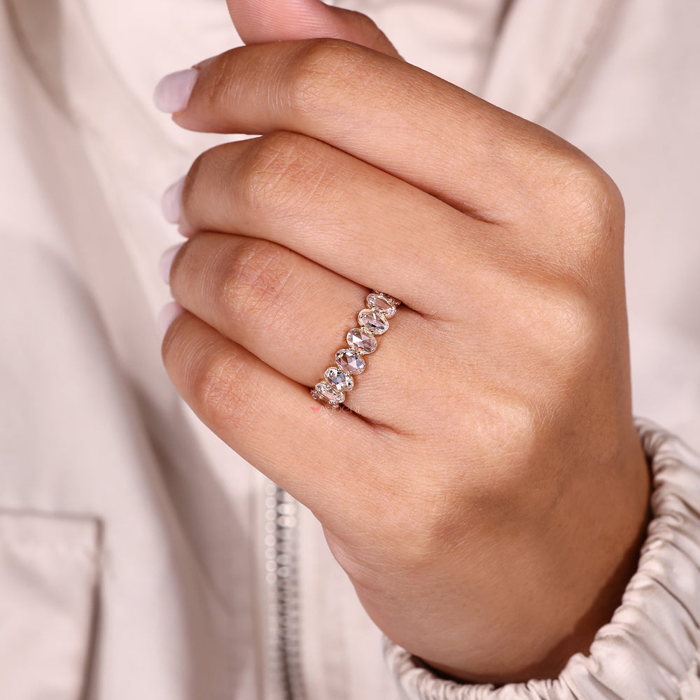 Oval rose cut diamond band with refined sparkle.
