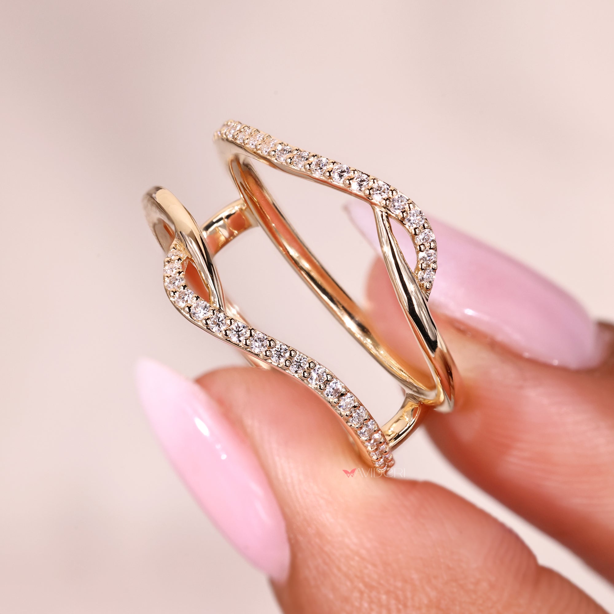 Buy a wedding band with a ring enhancer look.