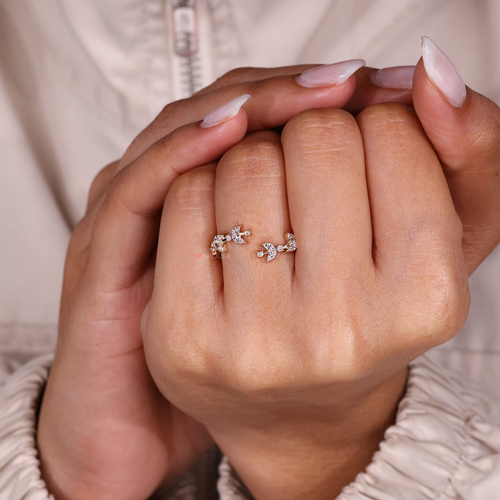 Elegant open gap diamond band with nature detail.
