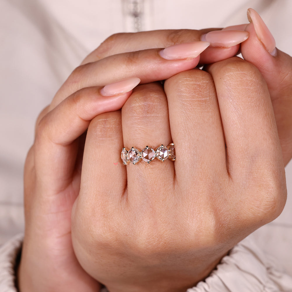 Minimal rose cut diamond band design.
