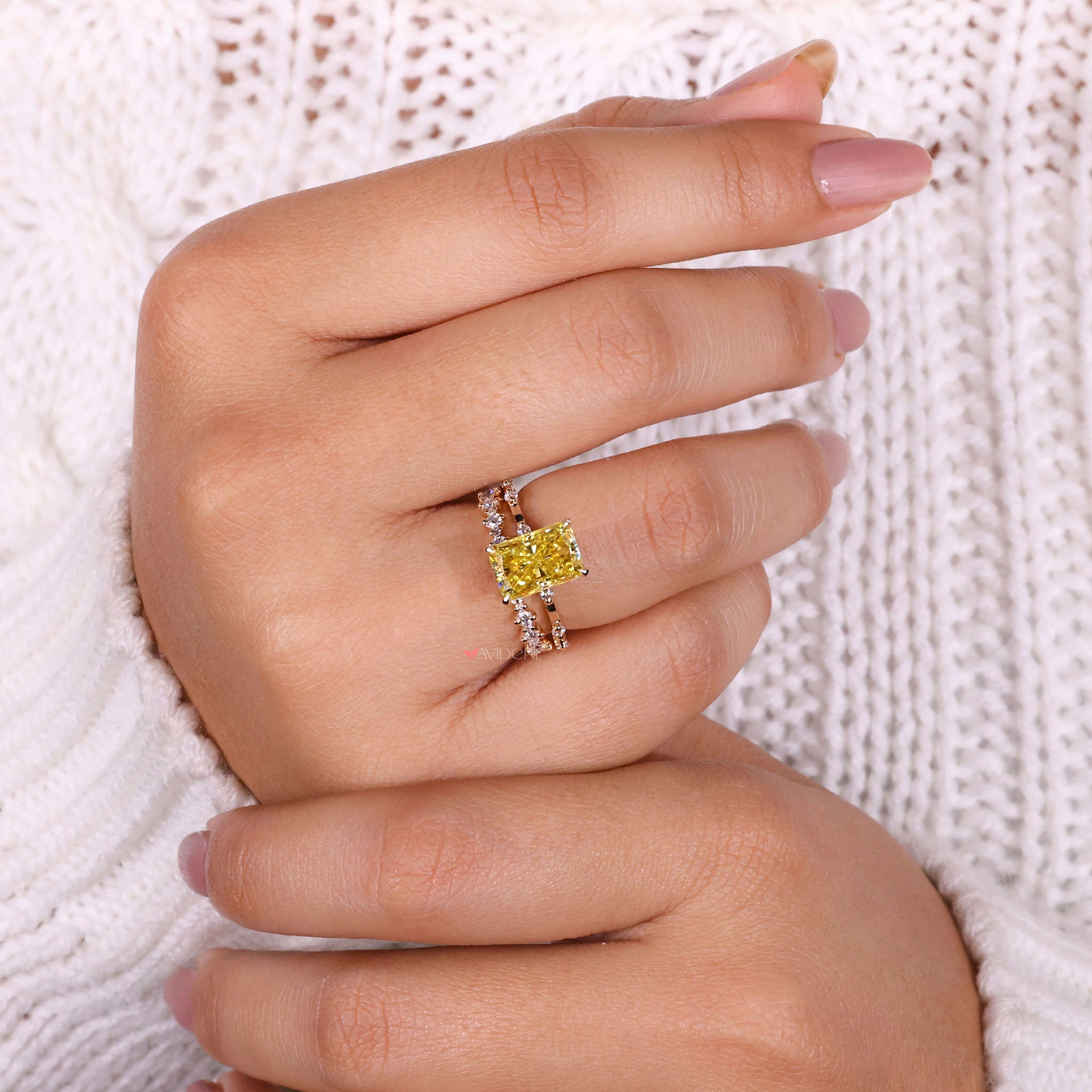 Canary Yellow Radiant Cut Moissanite shines with vibrant color and brilliance.