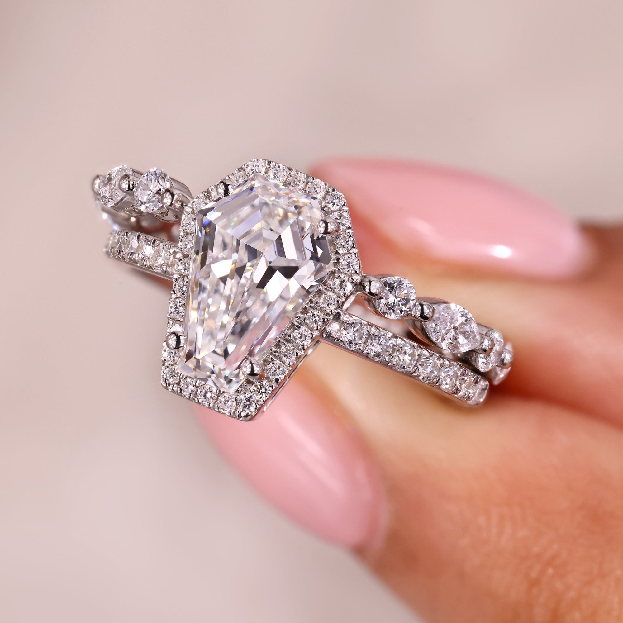 Halo diamond ring with diamond engagement ring and wedding band.
