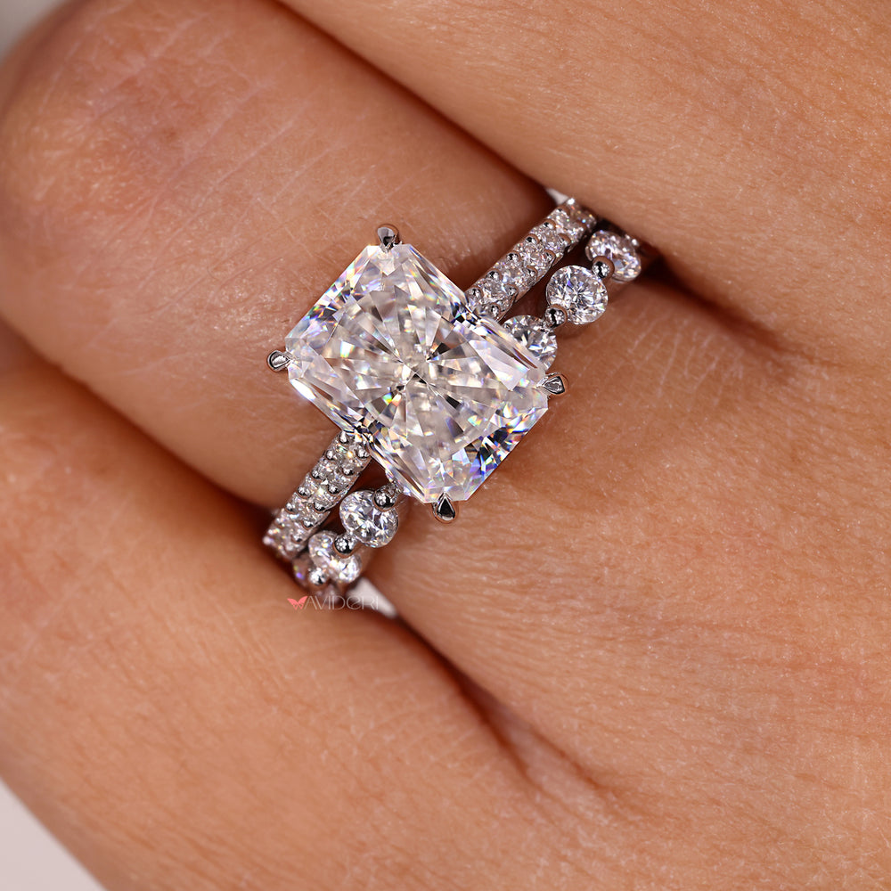 Handmade jewelry featuring radiant engagement and eternity band.
