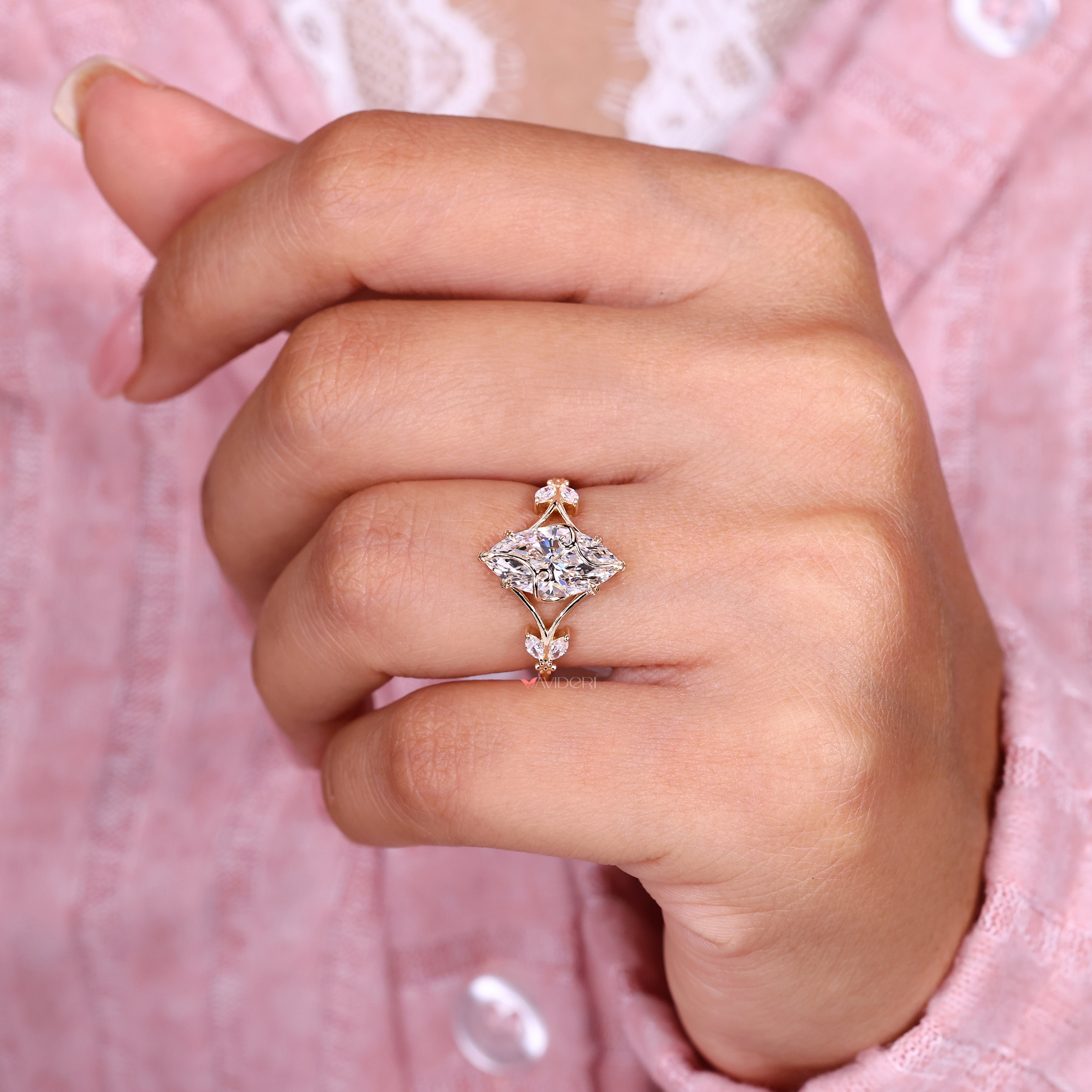 IGI certified marquise ring with six leaf prong setting
