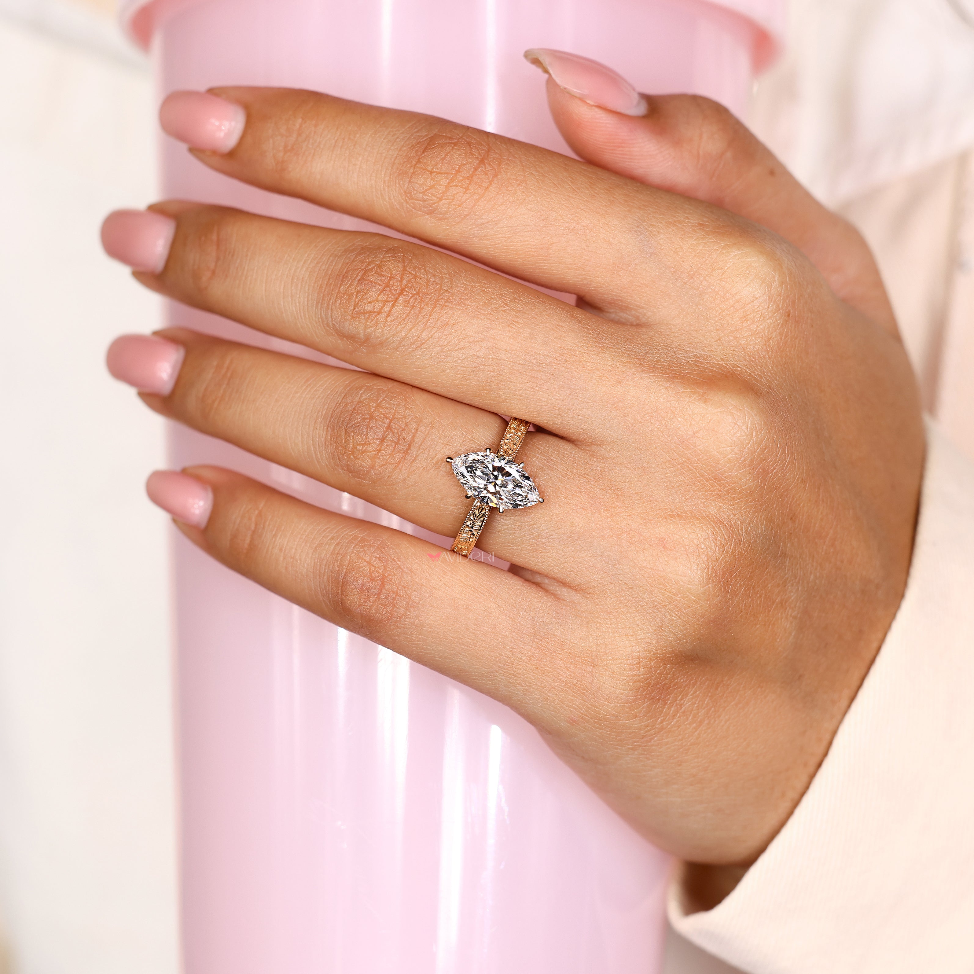 Vintage style marquise diamond ring with filigree band
