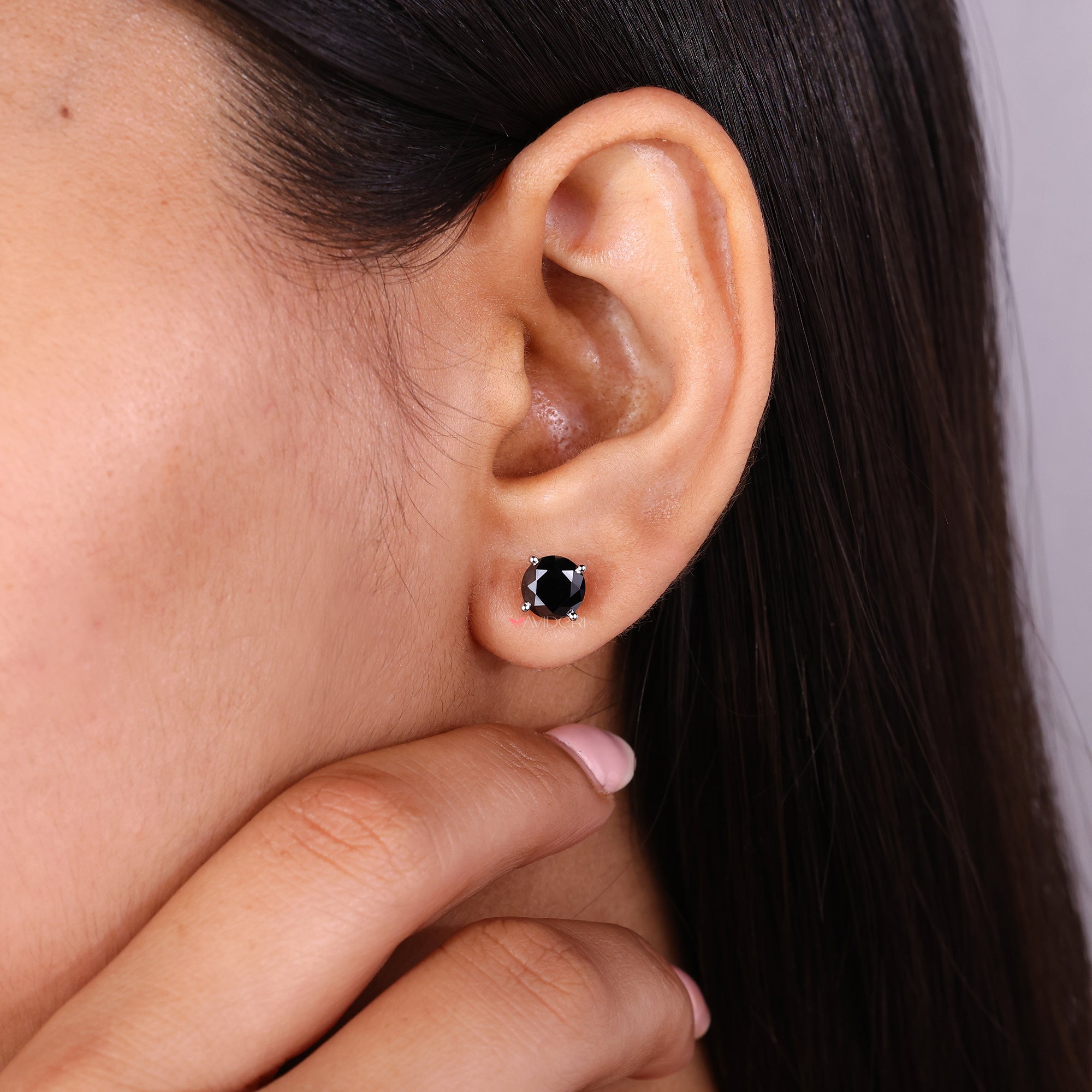 Avideri earrings featuring elegant white gold stud earring design with moissanite.