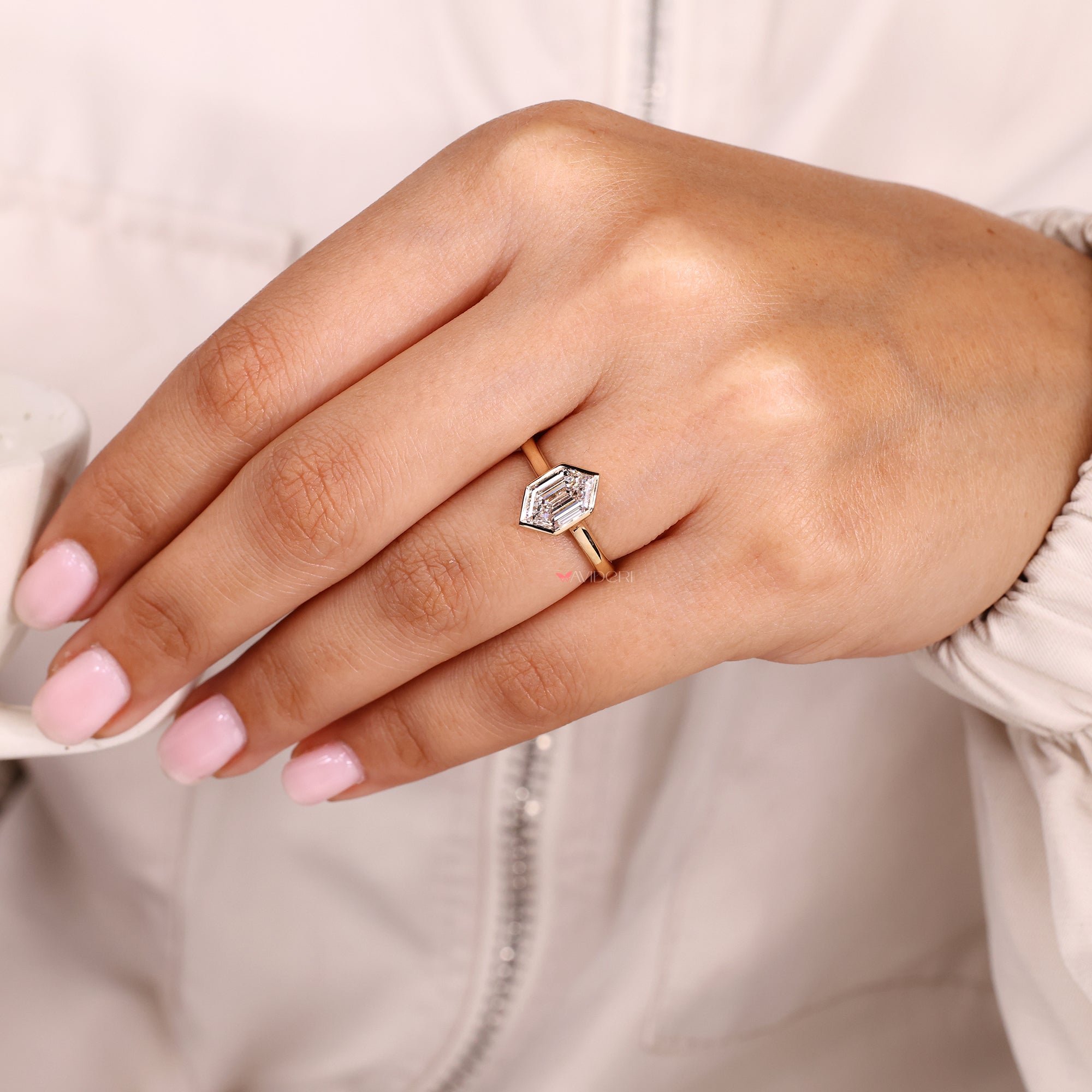 Lab-grown diamond ring with hexagon step cut diamond ring.
