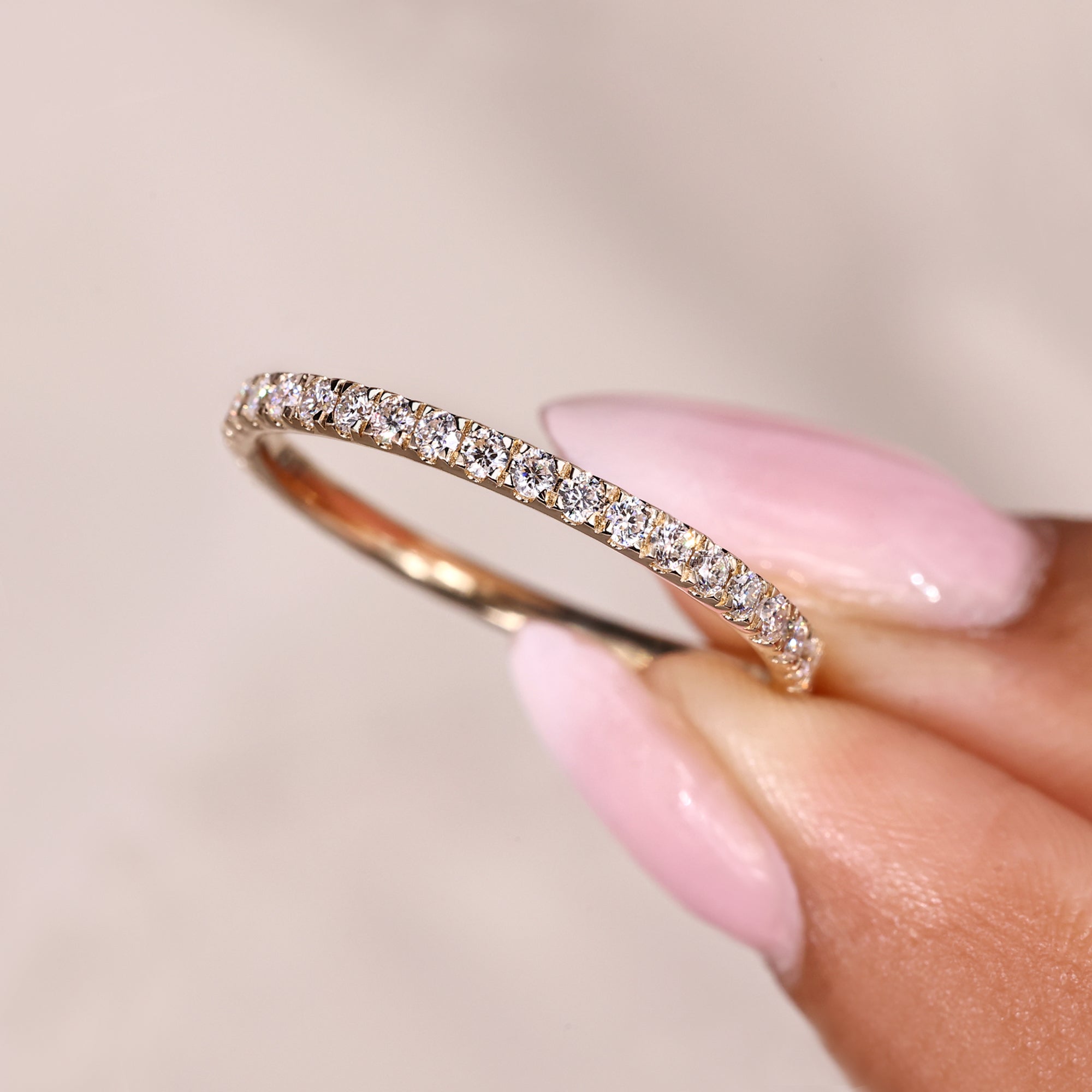 Round cut moissanite delivers ethical brilliance and elegant sparkle.