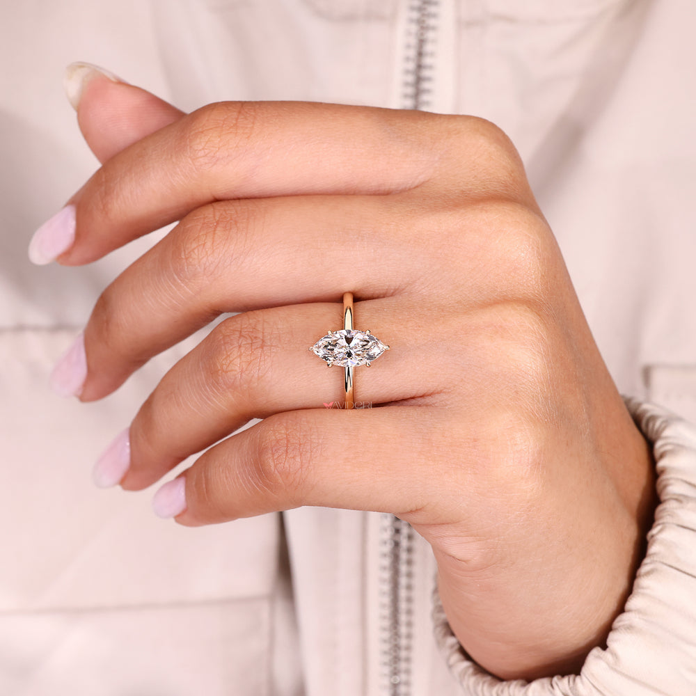 Avideri marquise cut ring with six claw prong setting.
