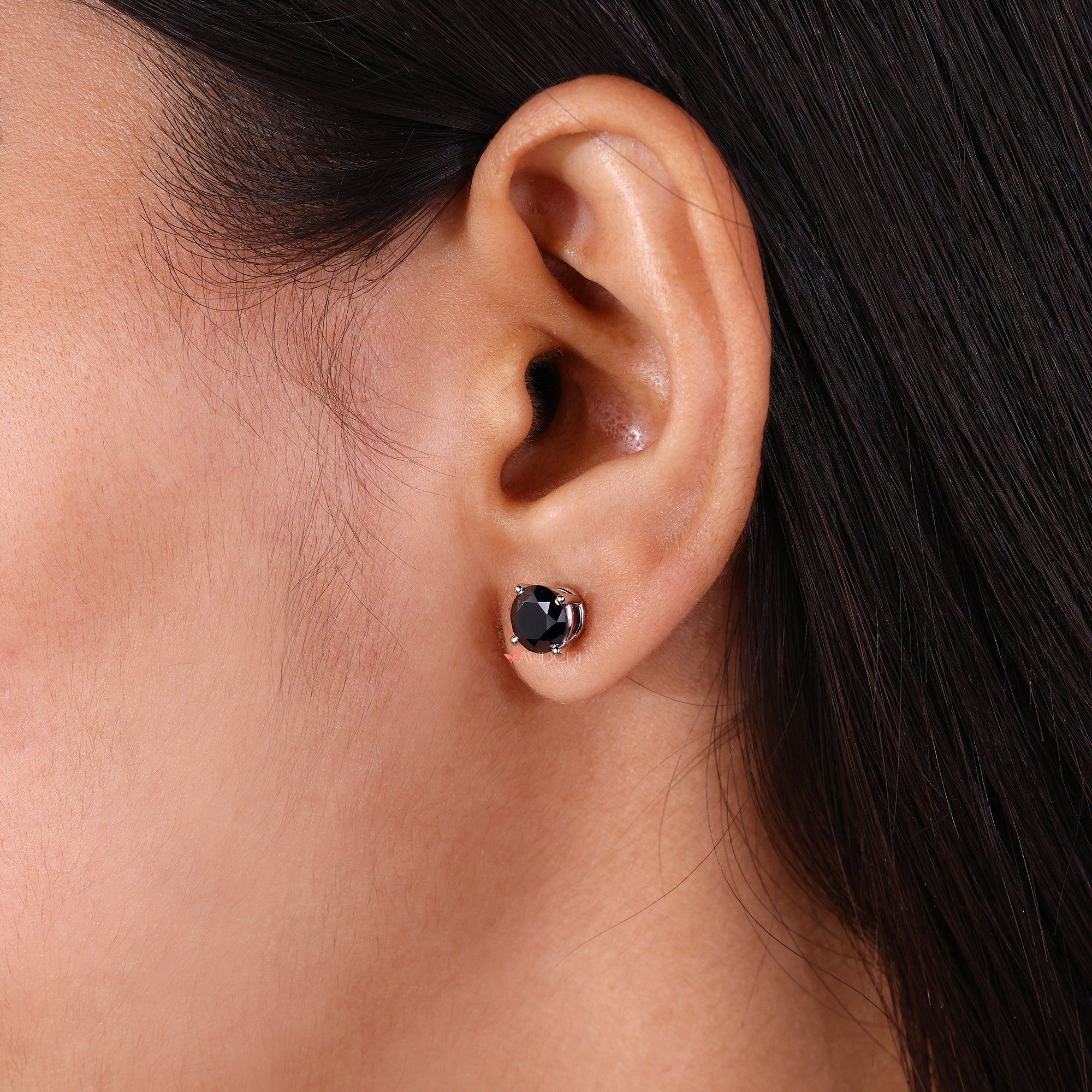 Moissanite earring design in a beautiful white gold setting.