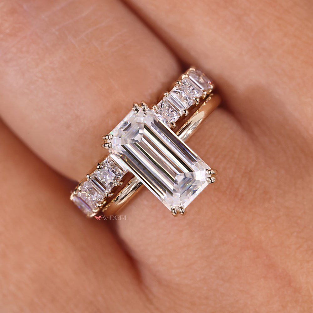 Emerald cut engagement ring styled with a bold look and yellow gold finish.
