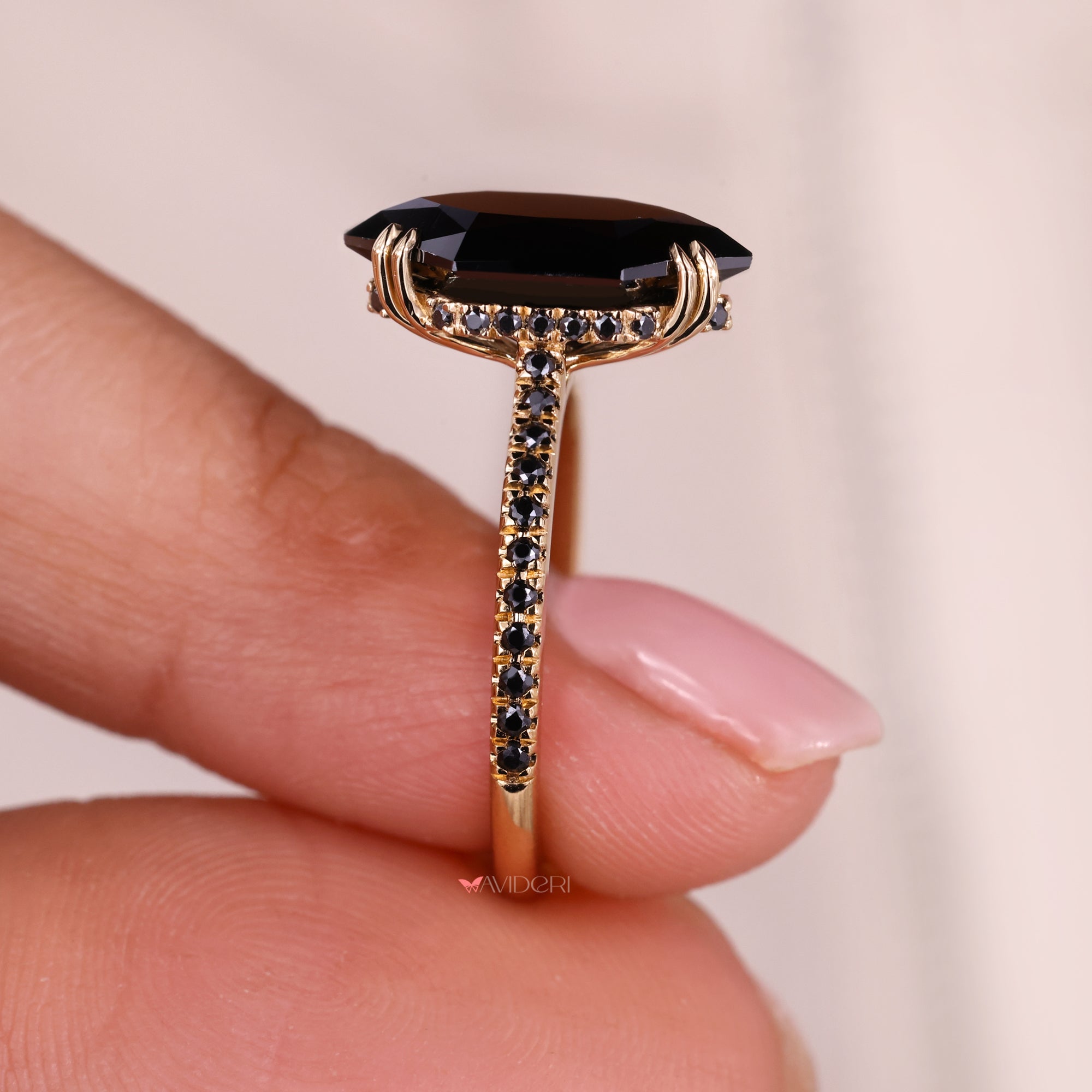 Hidden halo engagement ring with yellow gold engagement ring.