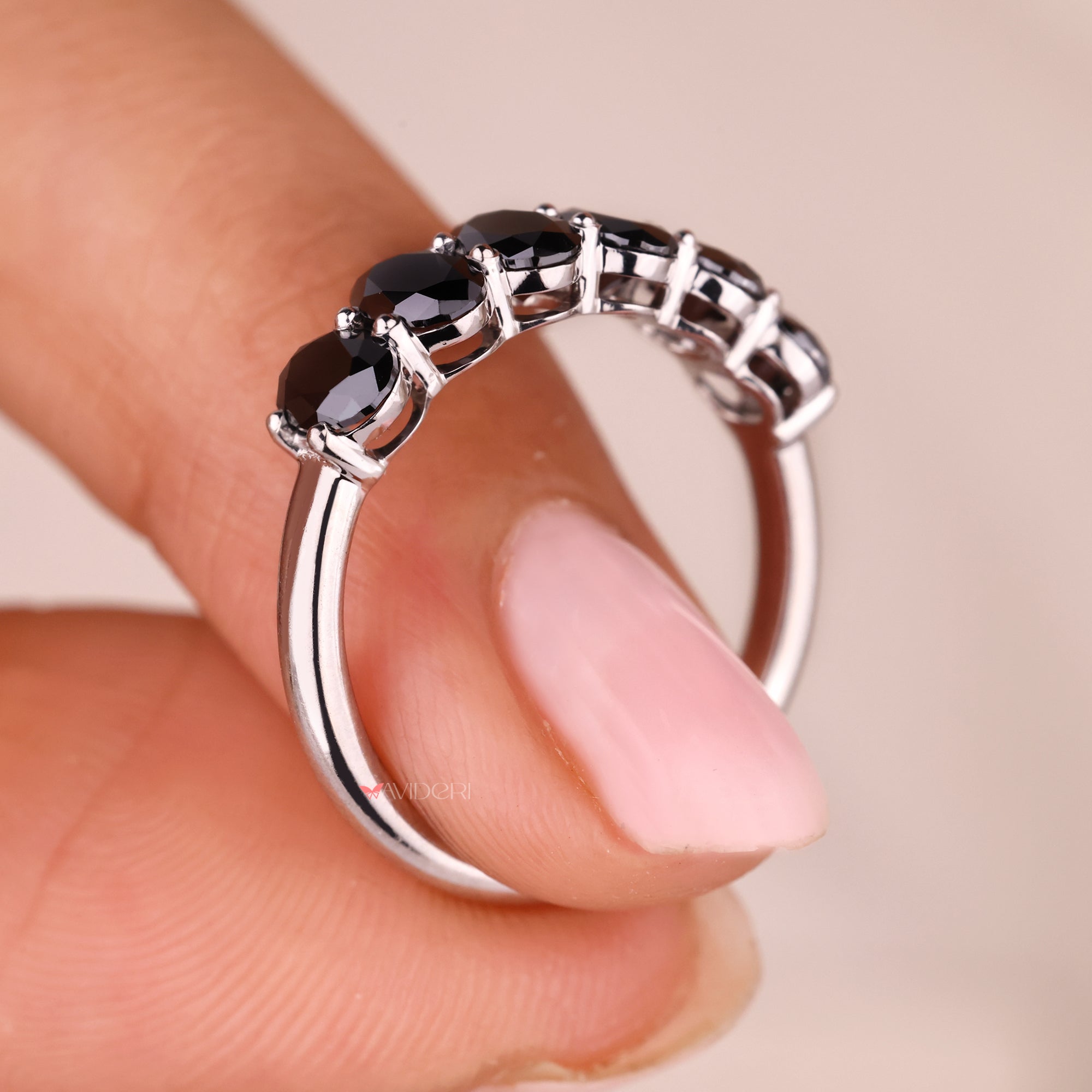 White gold wedding band with 6 stone band.