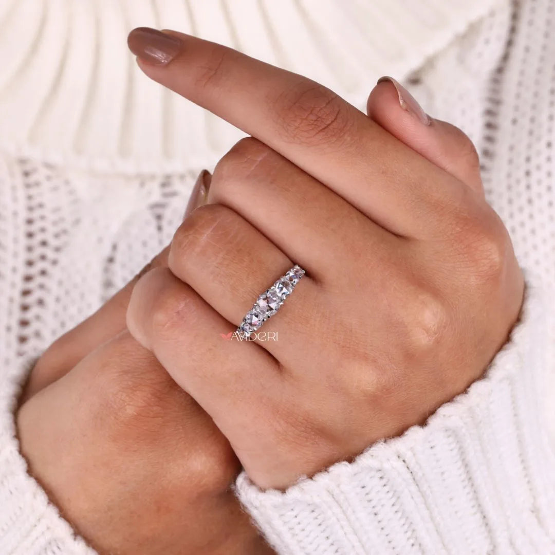 Round rose cut band with 4 prong claw setting.