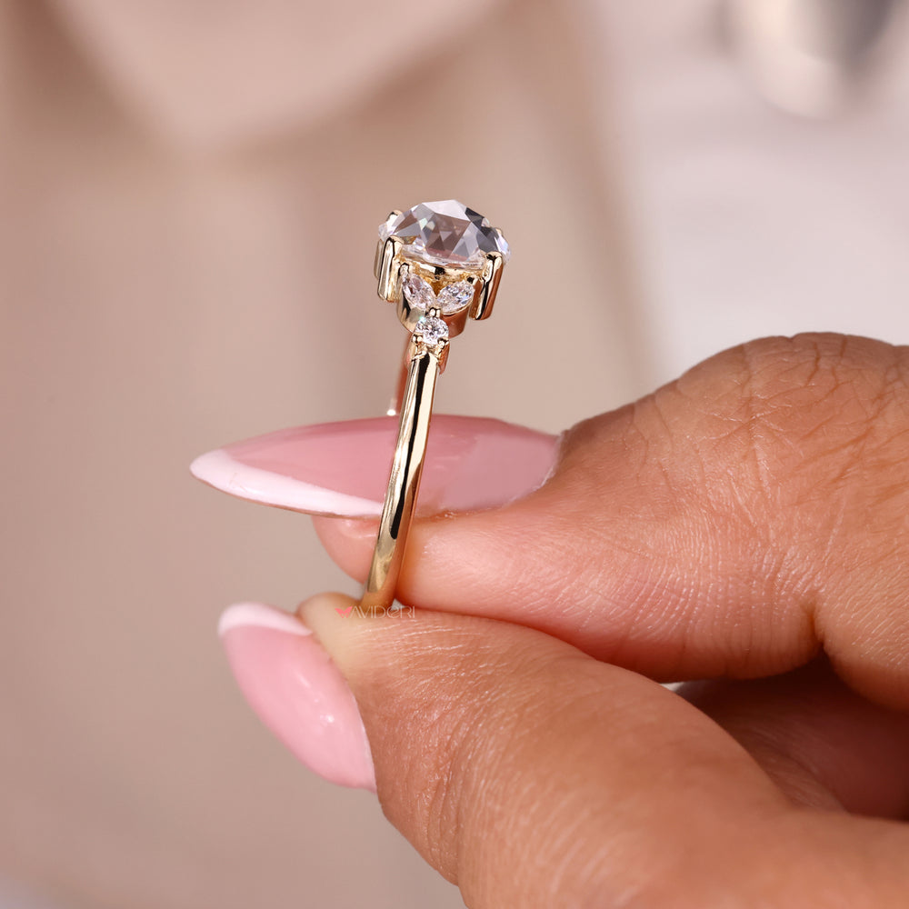 Gold yellow ring with a rose cut diamond for a luxurious finish.
