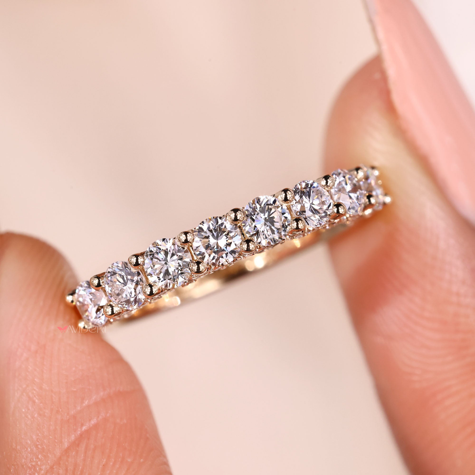 U prong micro pave diamond wedding band.
