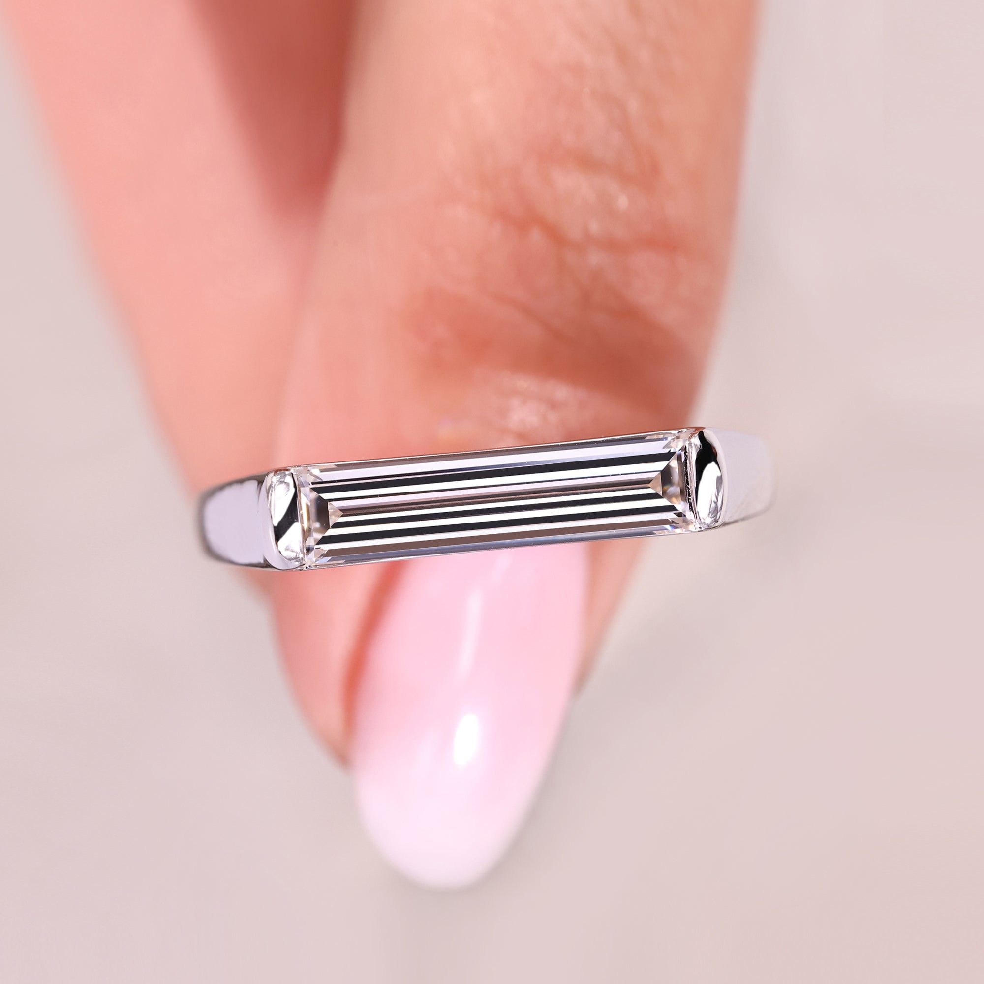 Buy engagement ring with simple baguette style.
