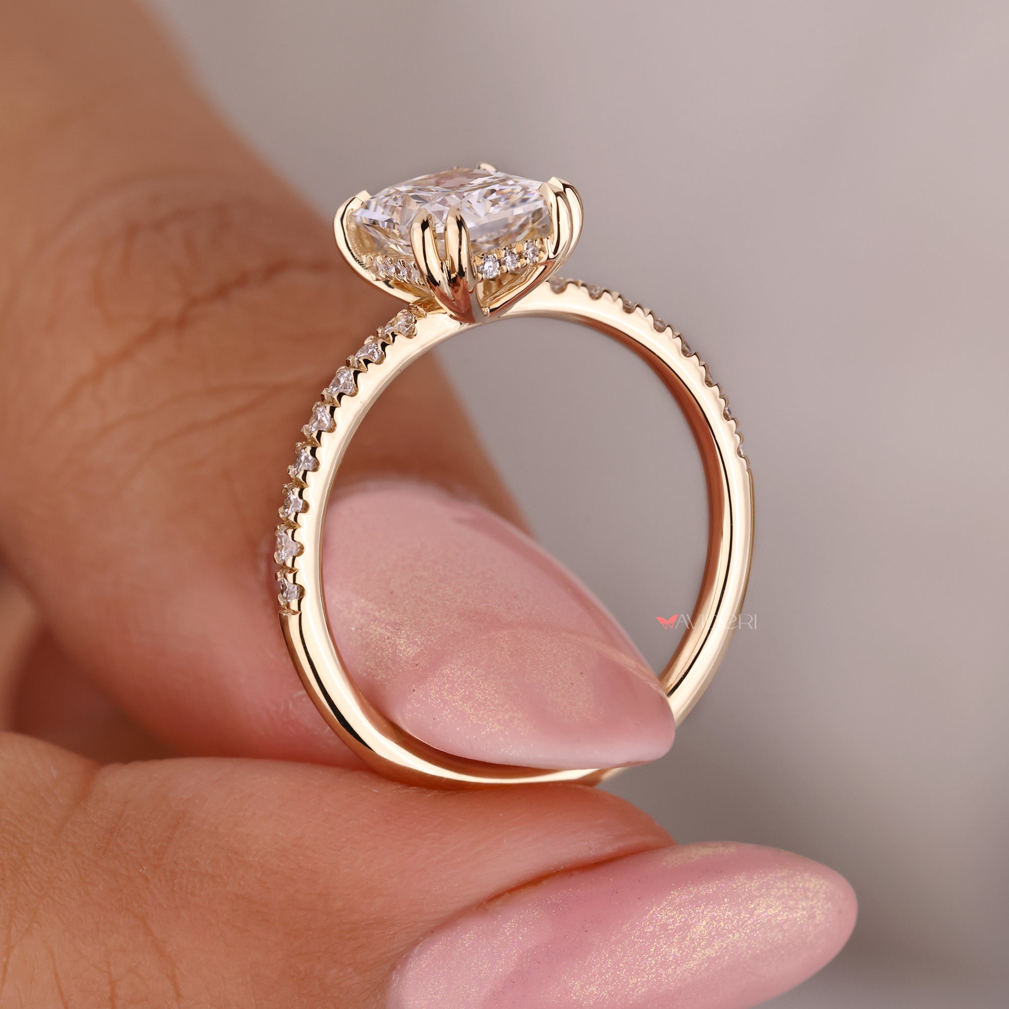 Hidden halo radiant engagement ring with radiant cut engagement ring.