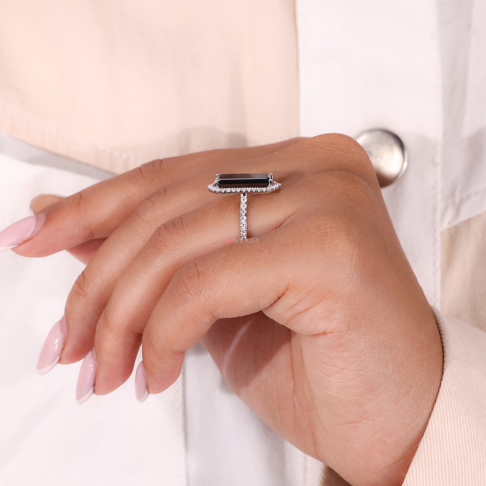 Long emerald cut ring, black diamond ring, white gold ring.