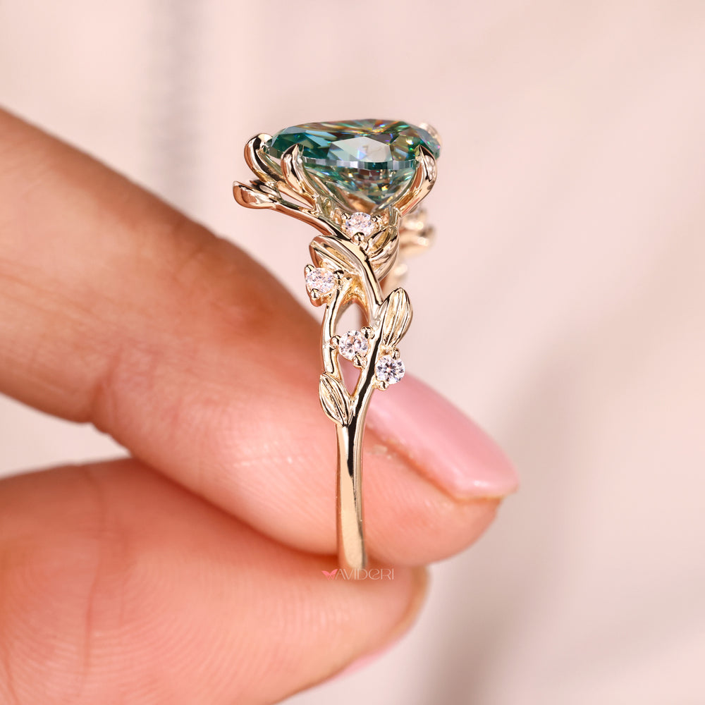 Nature inspired engagement ring with green stone engagement ring.