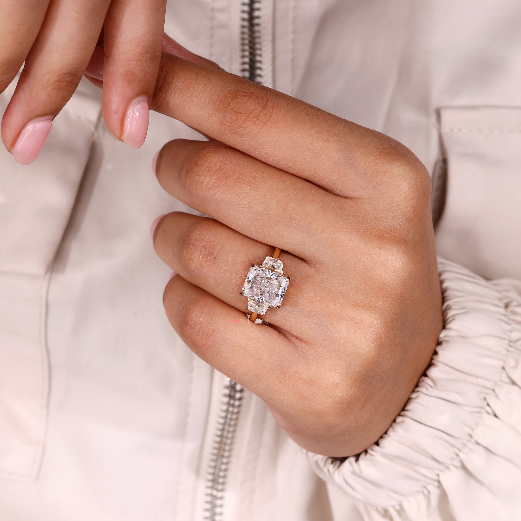 Handmade jewelry featuring radiant cut moissanite.