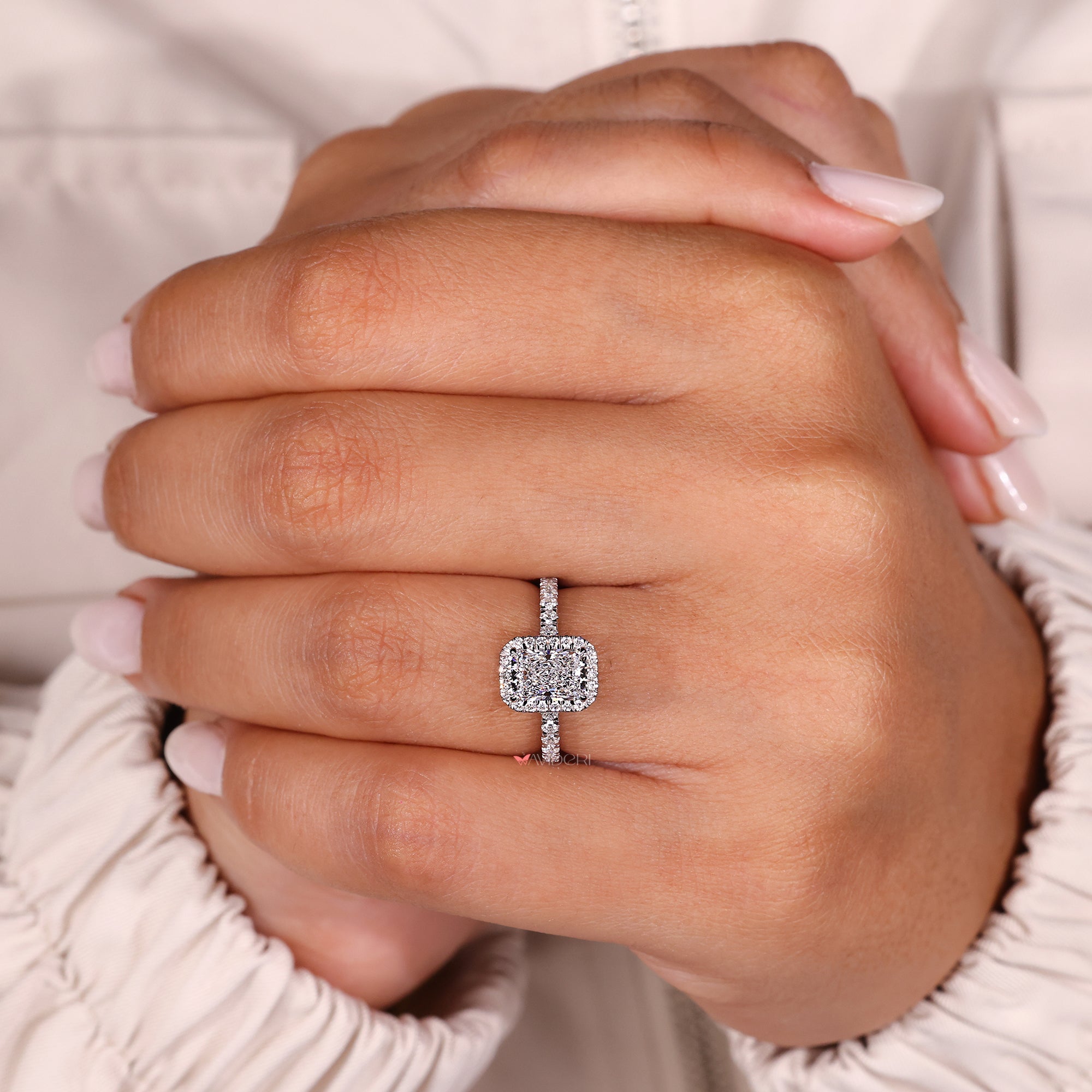 Avideri radiant cut engagement ring with prong setting.