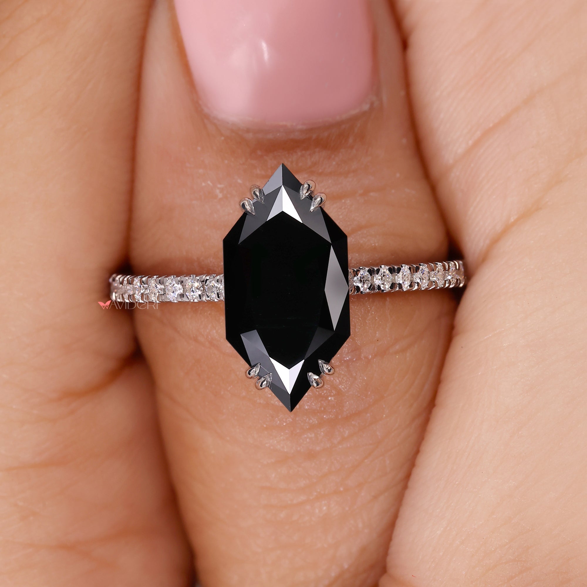 Avideri engagement ring with distinct artistic style.
