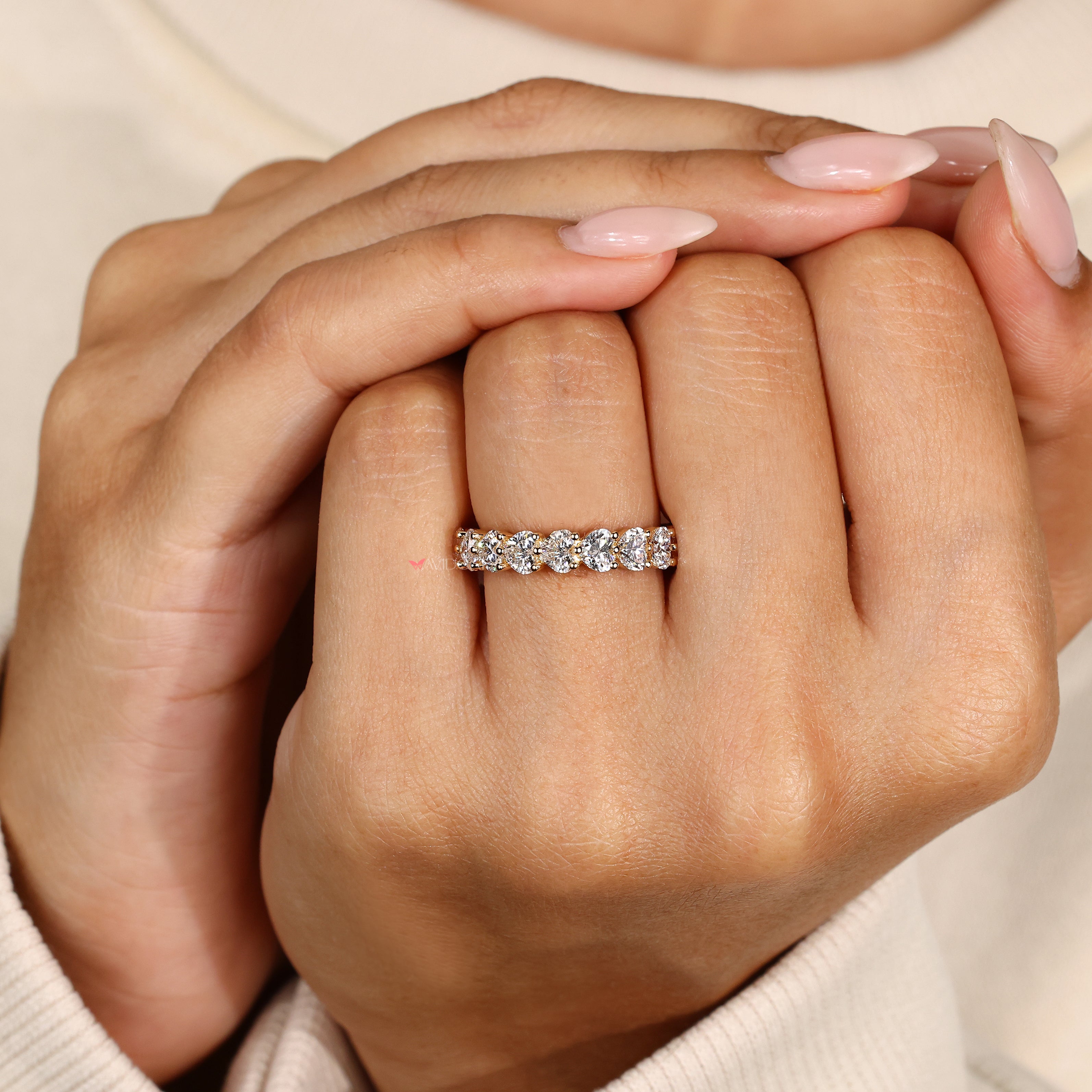 Handmade heart diamond eternity band design.

