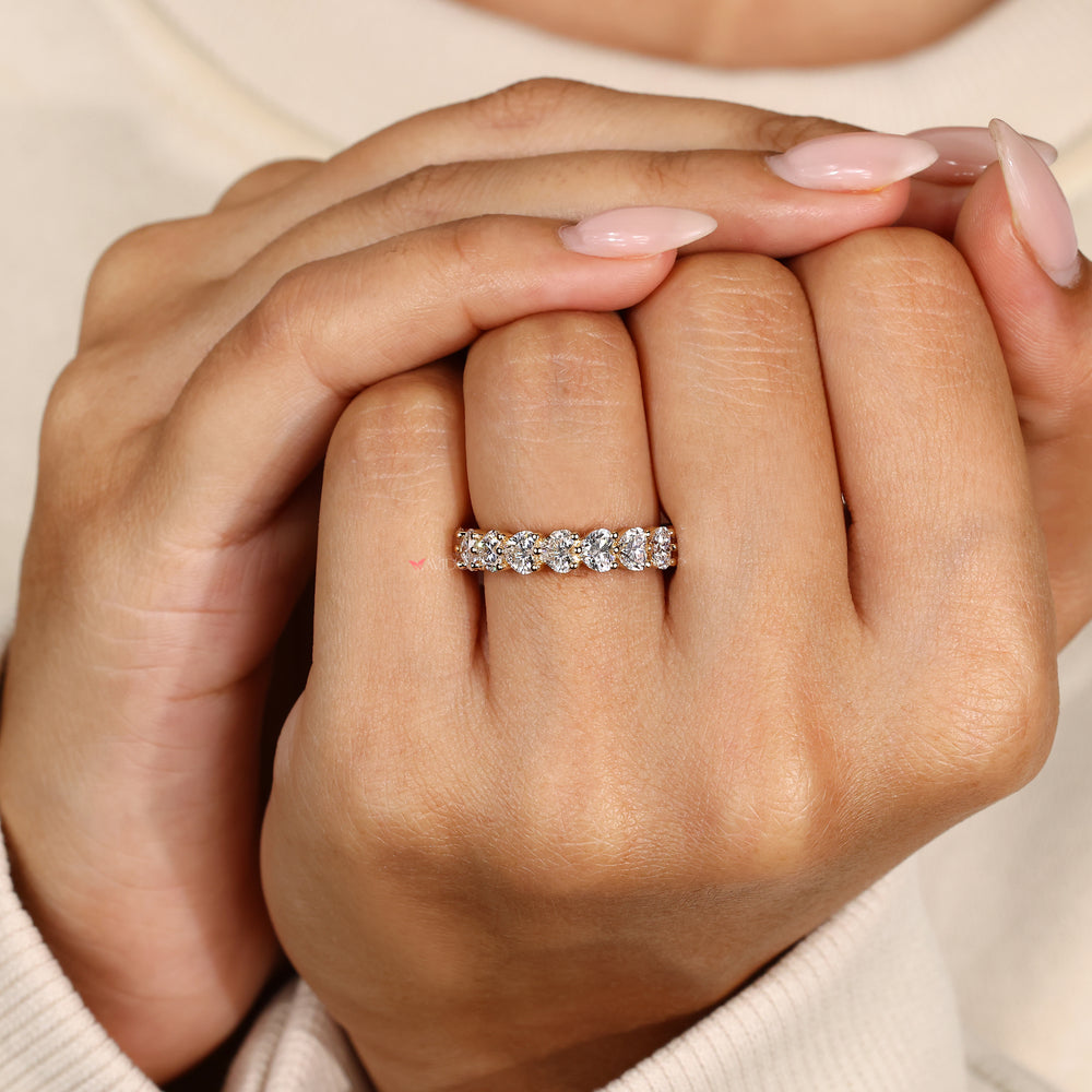 Handmade heart diamond eternity band design.

