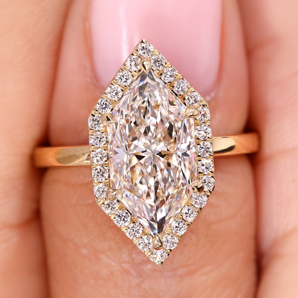 Halo engagement ring with Dutch marquise engagement ring.