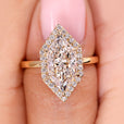 Halo engagement ring with Dutch marquise engagement ring.