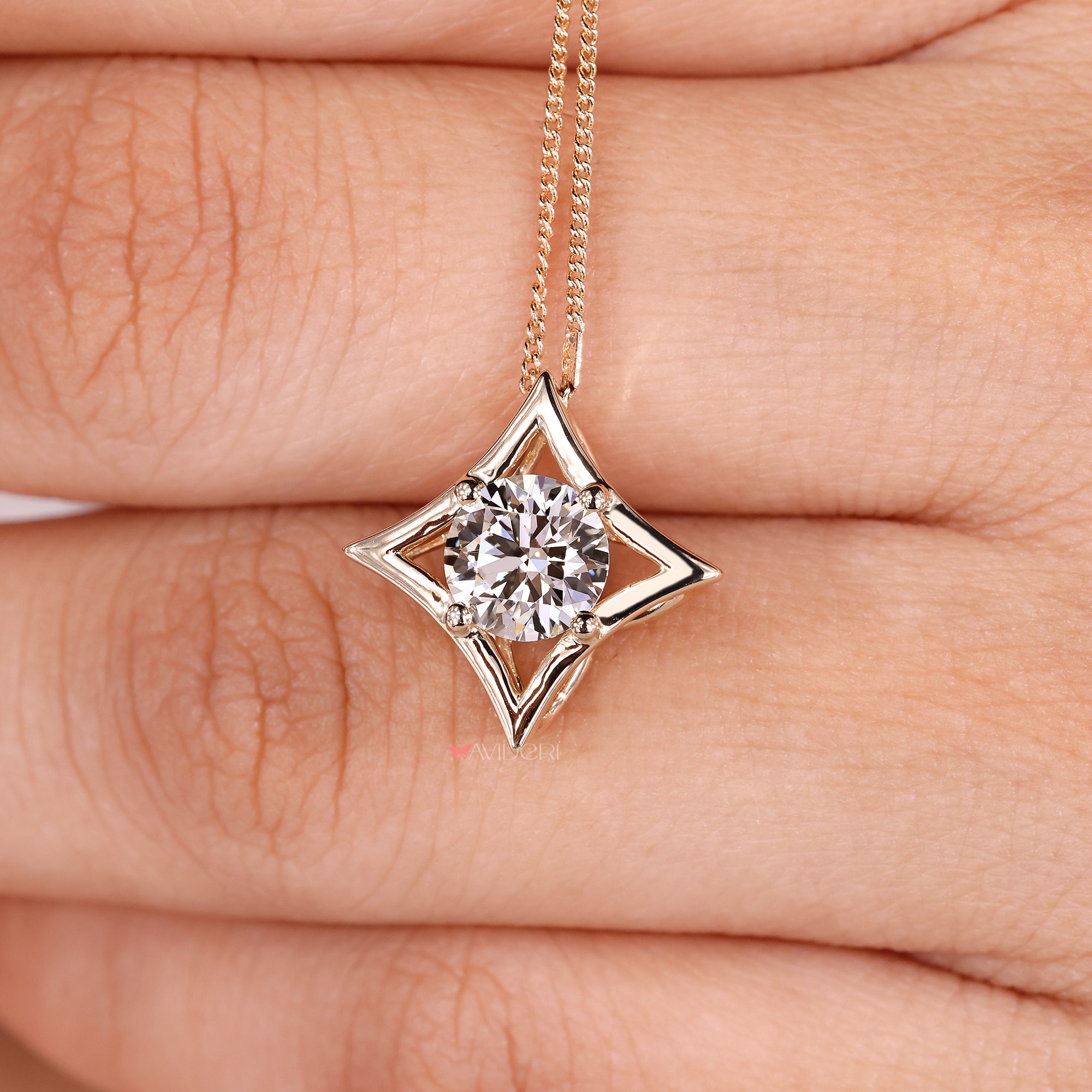 Round diamond pendant with yellow gold pendant touch.