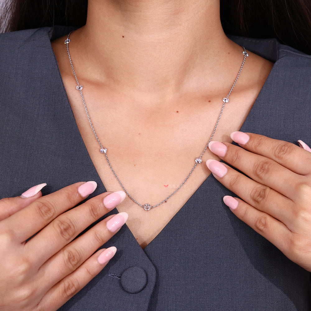 Chain diamond necklace with round stones.