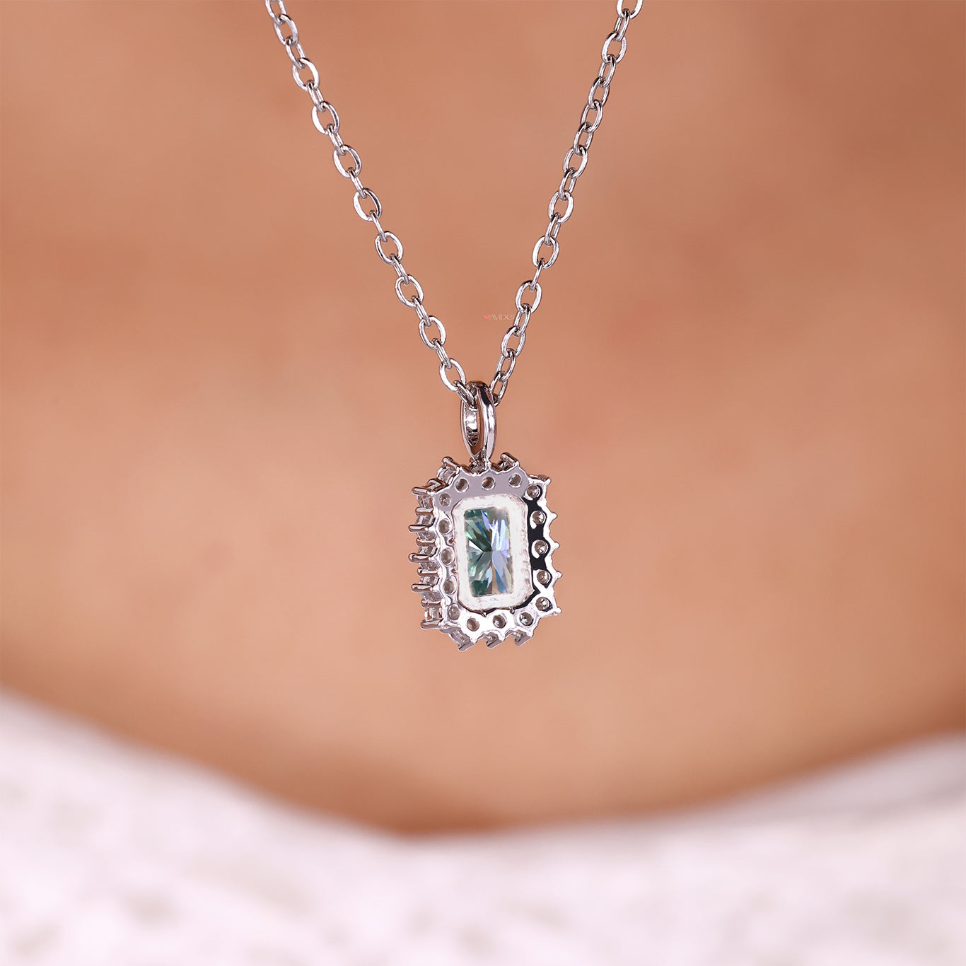 Radiant cut moissanite halo necklace pendant.
