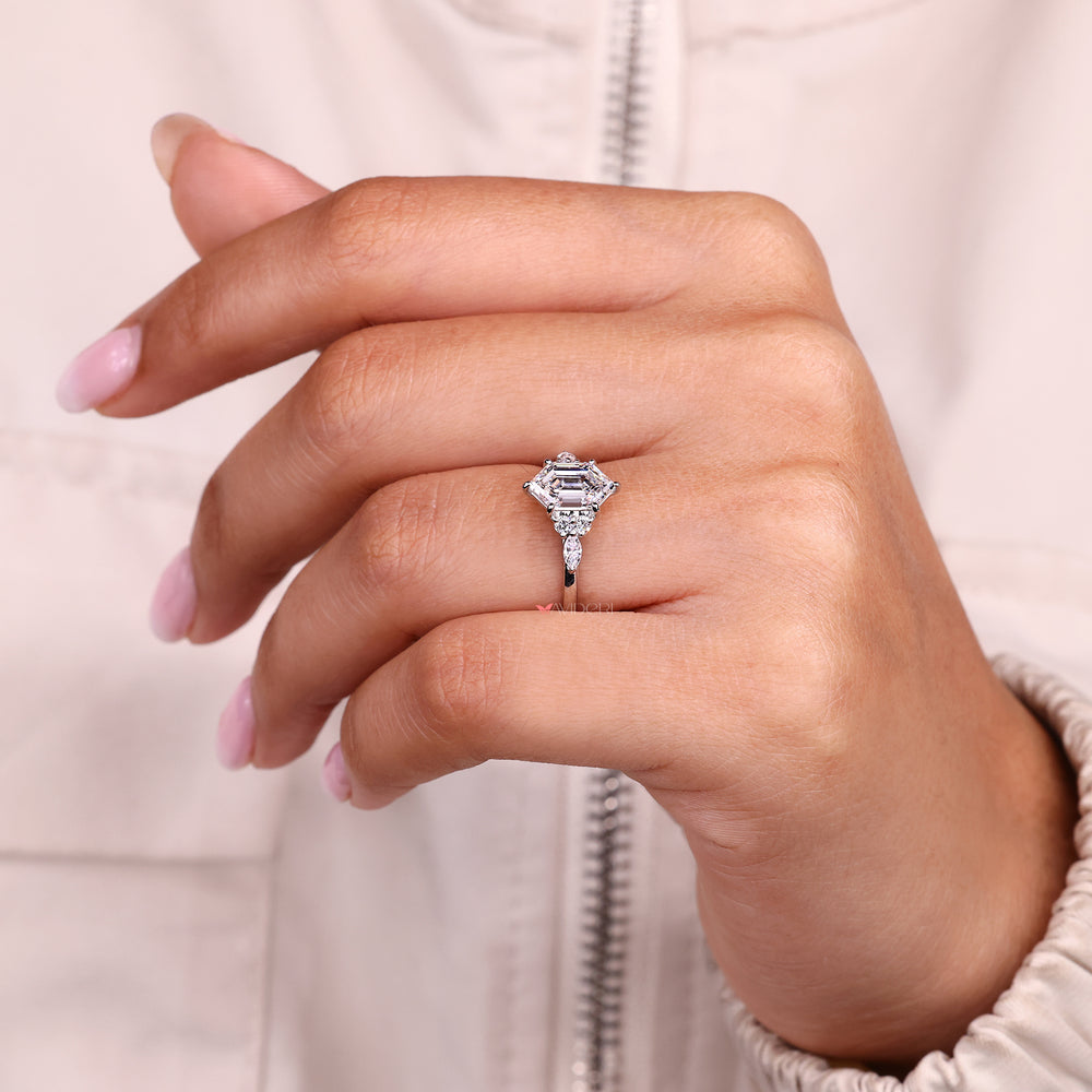 Handmade seven stone diamond ring with muse setting.