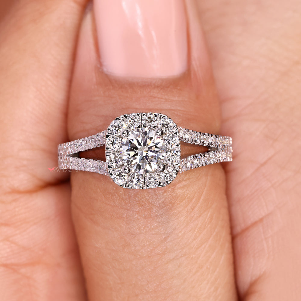 Round engagement ring with halo pave setting.
